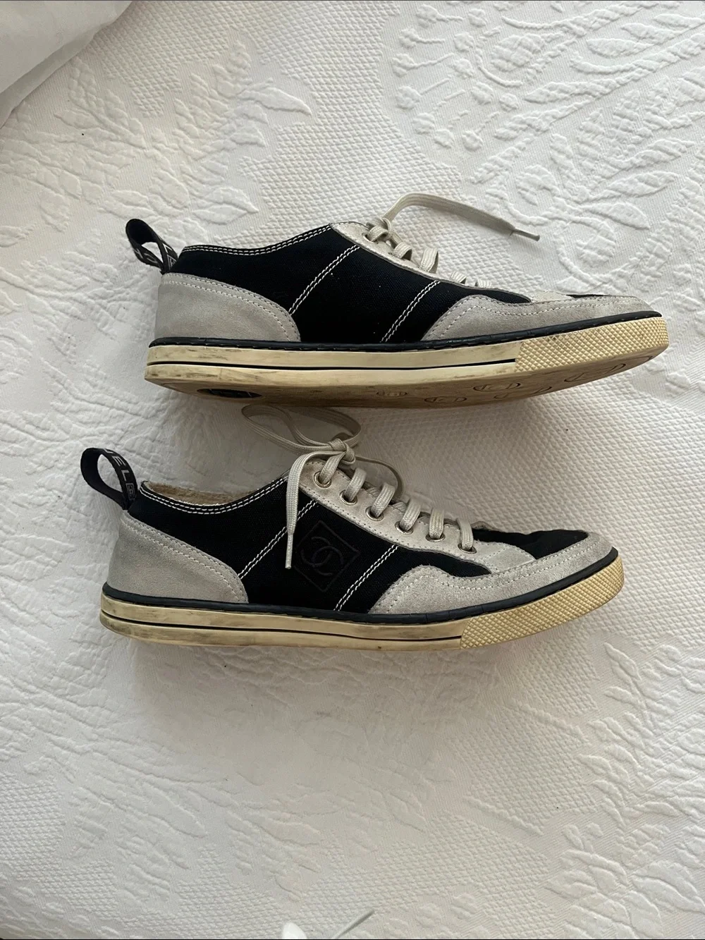 Chanel Women’s Black and Cream Lace-Up Sneakers